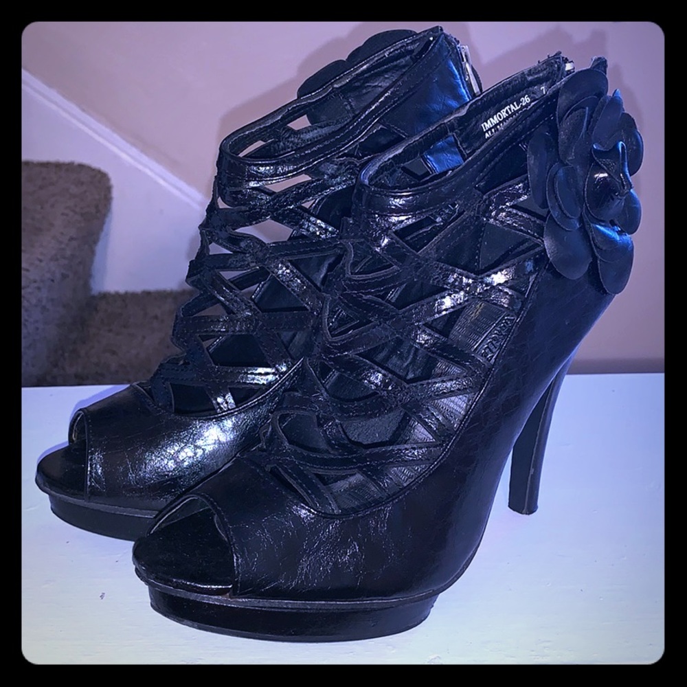 Anne Michelle black caged heels.